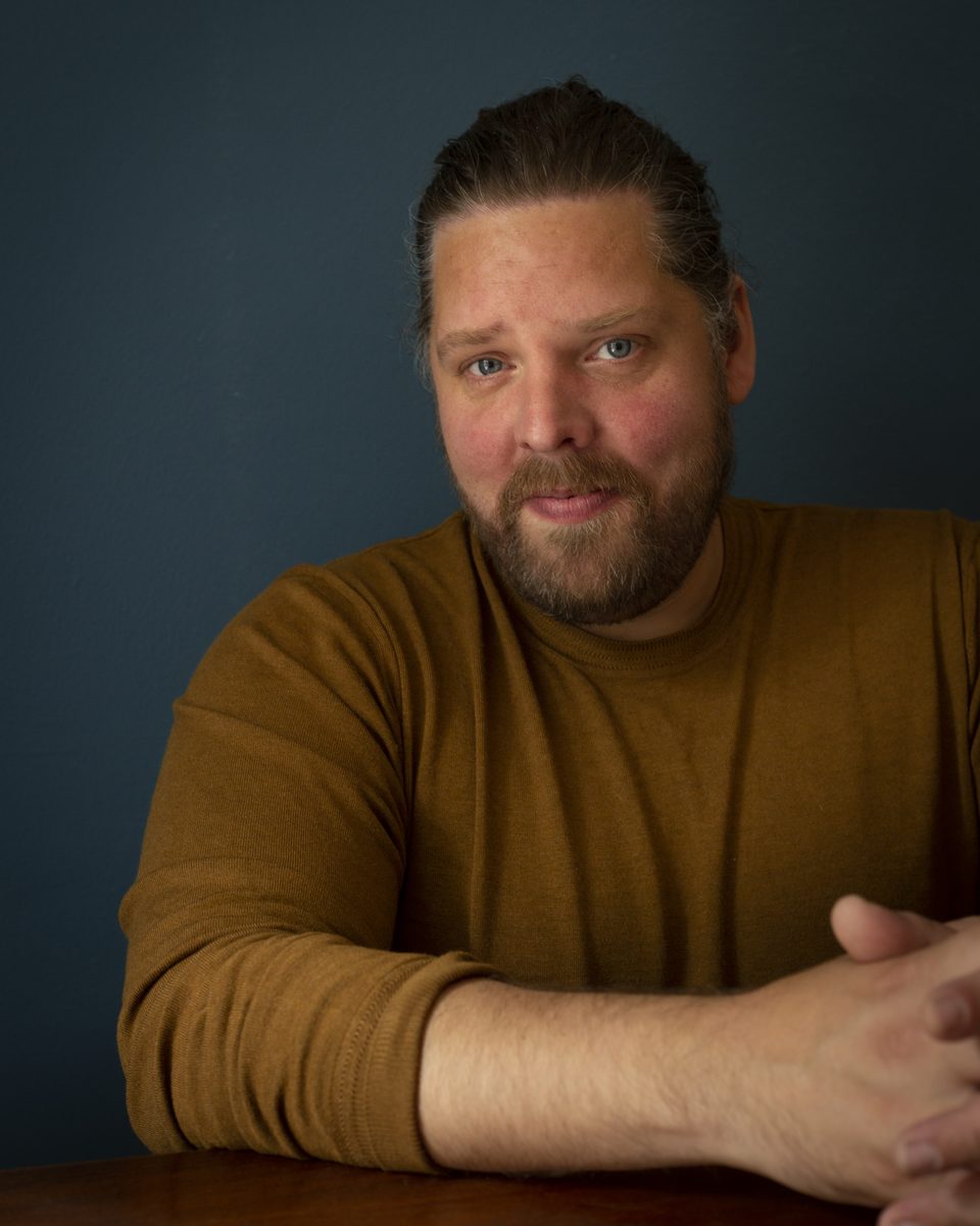 Portret van Tom, boekhouder en eigenaar van Tom Corp.